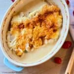 parmesan baked fish in creamy garlic sauce