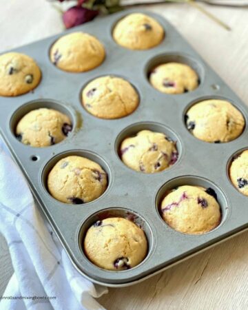 Kamut blueberry muffins in pan cooling