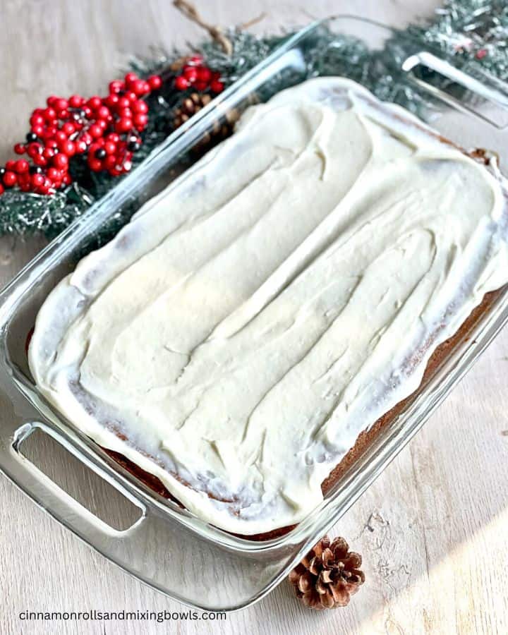 Eggless Holiday Spice from scratch cake with frosting in pan