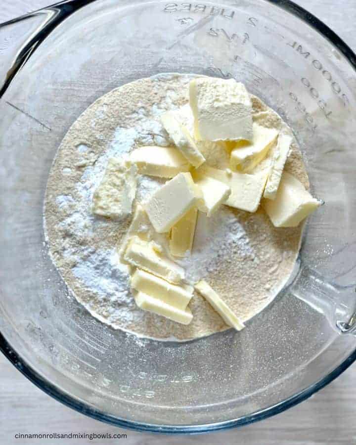 Easy Kamut Baking Powder Biscuits cutting butter into the flour mixture