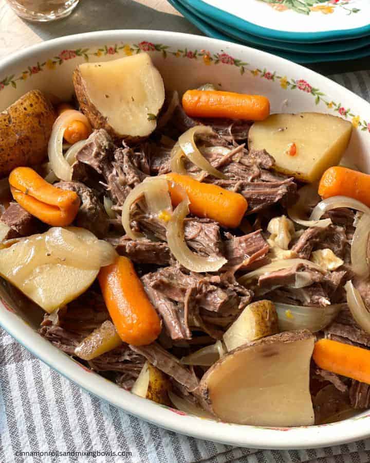 tender venison roast in the crockpot with gravy cooked
