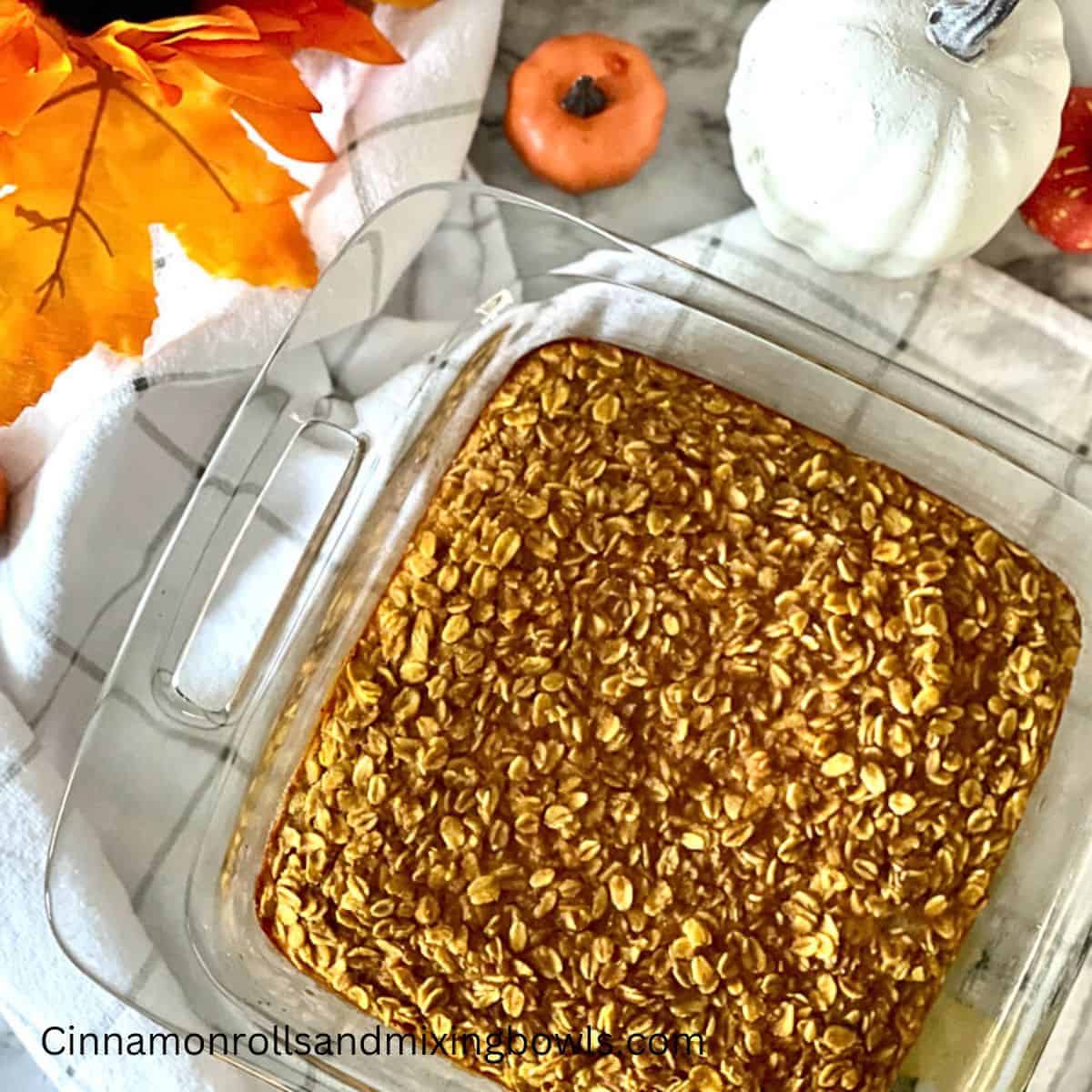 healthy pumpkin baked oatmeal in pan on table