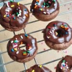 Kamut chocolate cake donuts baked on cooling rack