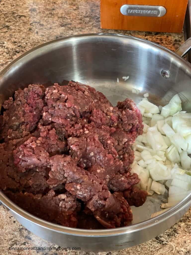 Meat and oil in a frying pan