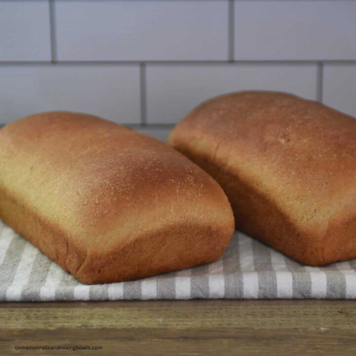 Homemade kamut bread loaves on cooling rack