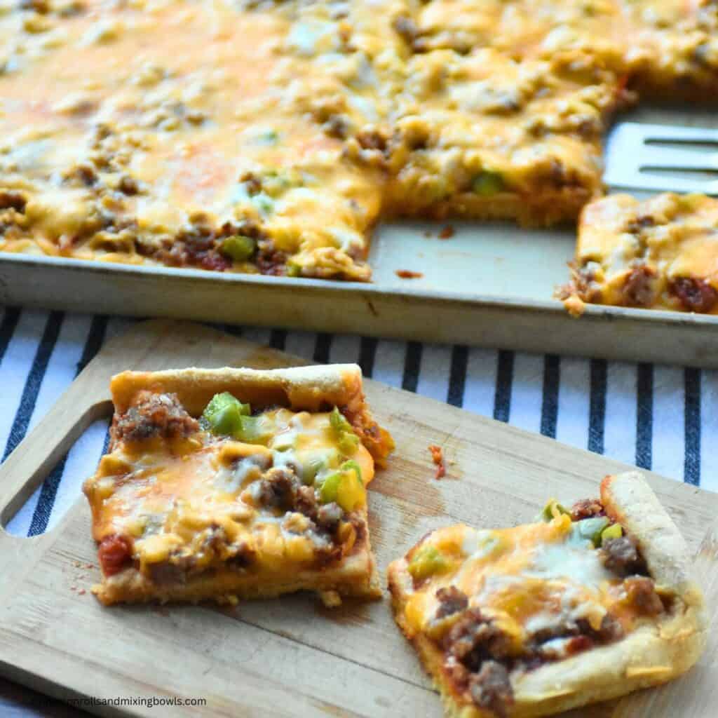Homemade pizza baked with toppings in pan